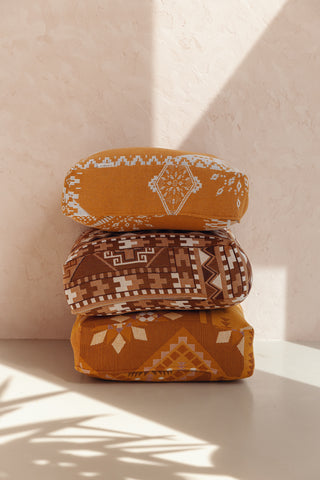 stack of floor cushions