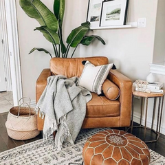 Brown leather ottoman